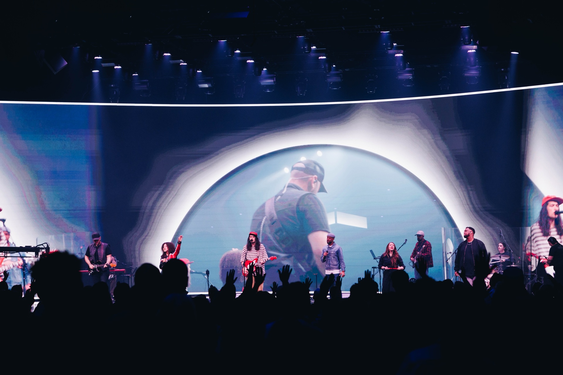 Large lyric display illuminated in blue at Cornerstone